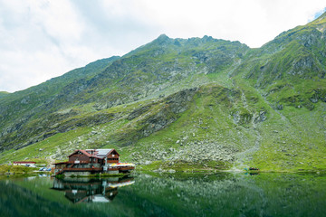Obraz premium the lake and the mountains tell us a story in the cottage