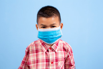 Boy wearing a protective face mask