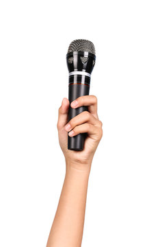 Woman's hand holding a microphone isolated on white background, clipping path
