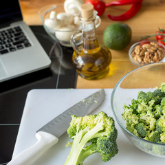 Flat lay of fresh vegetables on the kitchen table