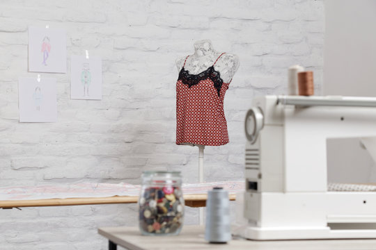 Tailor Shop Interior. Fashion Atelier. Fashion Design Studio, Sewing Machine And Mannequin, No People.