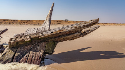 Fototapeta na wymiar A shipwreck in the Skeleton Coast National Park in Namibia in Africa.
