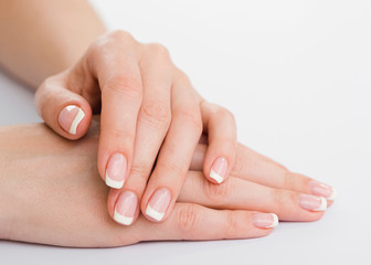 Folded female hands. Close-up