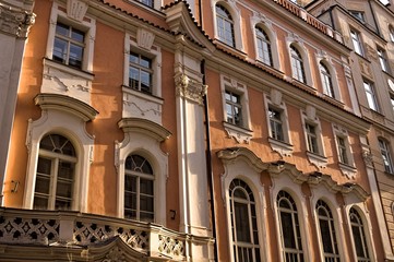 Naklejka premium Old orange building with decorated windows (Prague, Czech Republic, Europe)