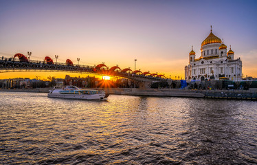 Fototapeta na wymiar Cathedral of Christ the Savior and Moscow river in Moscow, Russia. Architecture and landmark of Moscow. Sunset cityscape of Moscow