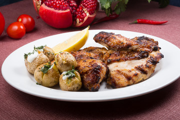 Grilled chicken with potatoes