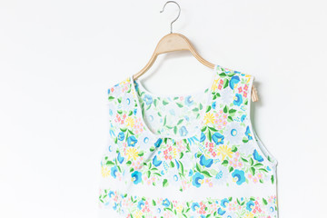 Woman blouse with summer blouse cotton on white background.