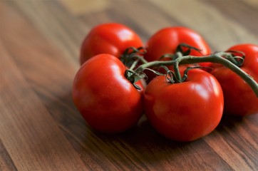 tomatoes on a wooden table
