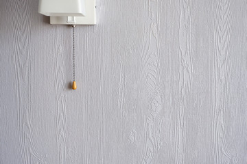 white lamp on a blue wall. Interior. Minimalism
