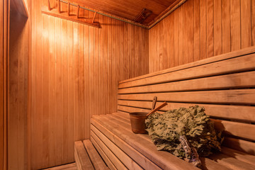 sauna bathhouse warm interior inside empty brooms barrels bucket for water