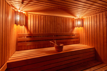 sauna bathhouse warm interior inside empty brooms barrels bucket for water