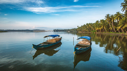 Naklejka na ściany i meble boat on the lake,backwaters Kerala