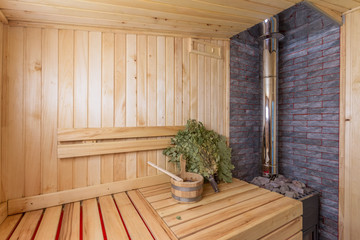 sauna bathhouse warm interior inside empty brooms barrels bucket for water