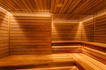 sauna bathhouse warm interior inside empty brooms barrels bucket for water