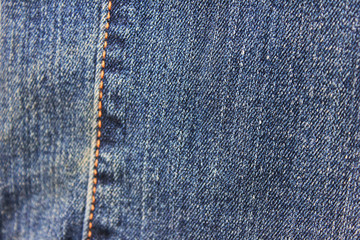 Naklejka premium Denim blue jeans szew bliska widok szczegółowy. Wzór ściegu na klasycznej fakturze tkaniny dżinsowej, nowoczesny projekt tkaniny dżinsowej ze szwami, widok z góry zbliżenie