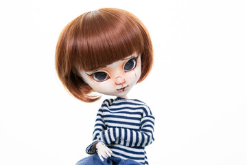 doll face portrait close up with copy space girl childhood toys in white background