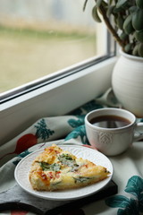 Quiche, cheese, tomato and spinach pie