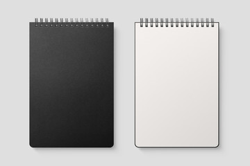 Real photo, spiral bound notepad mockup template with black paper cover, isolated on light grey...