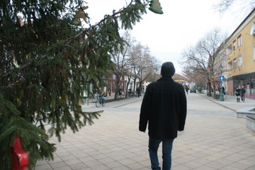 A person walking down a street