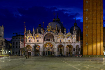 Night view of Basilica di San Marco and Campanile on piazza San Marco in Venice, Italy. Architecture and landmark of Venice. Night cityscape of Venice.