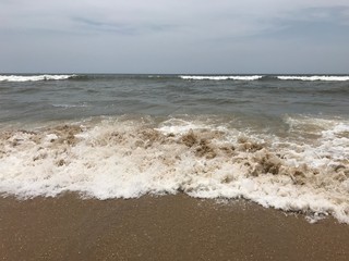 Fototapeta na wymiar waves and sand