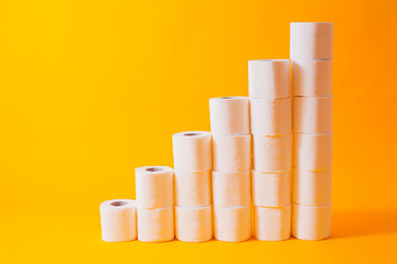 Shedule toilet paper rolls isolated on yellow