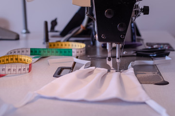Fabrication de masques lavables pour la protection du visage contre virus du covid-19, coronavirus, allergie, épidémie et pandémie mondiale.	