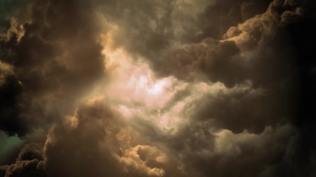 Flying through storm clouds. Cinematic 4K animation of storm clouds with lightning flashes. The camera spins and shakes as it travels forwards. Clouds fly through stormy.