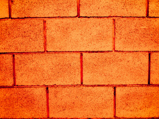 Texture of an orange brick wall.