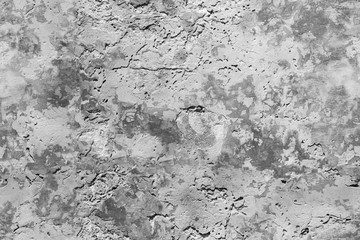 Old grungy concrete wall texture with damaged paint