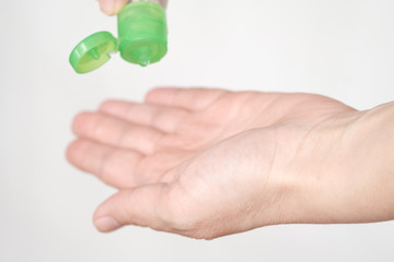 Health care concept. Antibacterial sanitizer gel on woman hands. hygiene concept. prevent the spread of germs and bacteria and avoid infections corona virus. Wash your hands