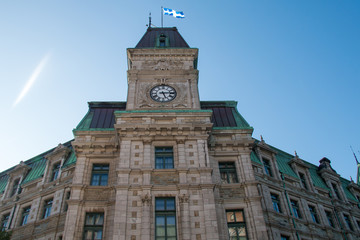 The old post office with its clock tower and monument to Samuel de Champlain, founder of Quebec City by Paul Chevré in 1898.
