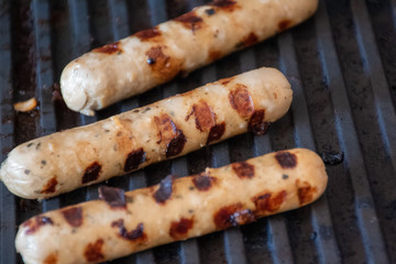 vegetarian sausages on a bbq 