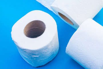 isolate paper towel rolls. white tissue paper for clean every think on blue background.