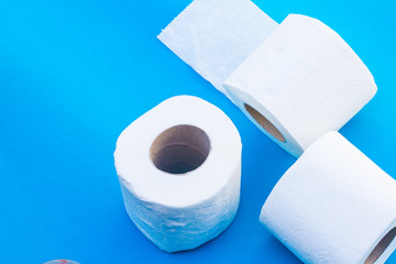 isolate paper towel rolls. white tissue paper for clean every think on blue background.