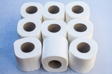Toilet paper-Tissue paper roll. The reel of the toilet paper on the white background. Roll of toilet paper- Cheap wc wiping paper product hygienic purposes.Rolls of toilet paper. Wc papers.N