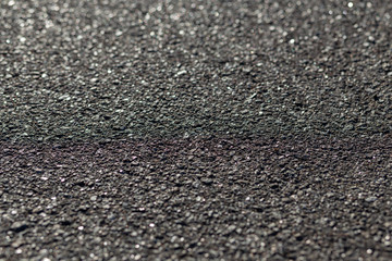 texture of asphalt closeup on a sunny day