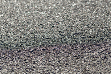 texture of asphalt closeup on a sunny day