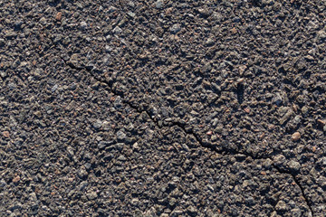 texture of asphalt closeup on a sunny day