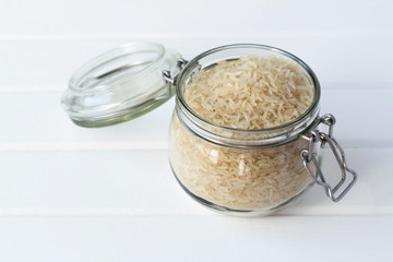 rice in a glass jar is on the table