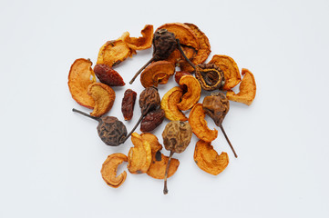 Composition from dried fruits isolated on white background.