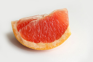 red grapefruit on white background