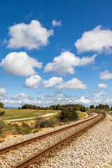 Fototapeta premium Train railway near golf course 