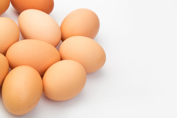a lot of chicken eggs on a white background