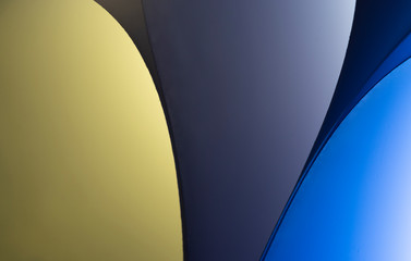 Yellow and blue paper sheet waves