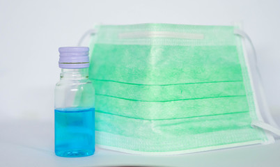 Coronavirus prevention medical surgical masks and hand sanitizer gel for hand hygiene corona virus protection.