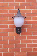 Light fixture on the wall.