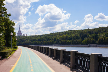 Moscow River Embankment. Behind the trees building Moscow State University