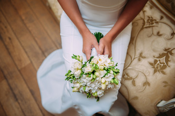 Obraz na płótnie Canvas Wedding bouquet of the bride in hand
