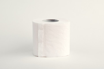 A roll of toilet paper on white background.